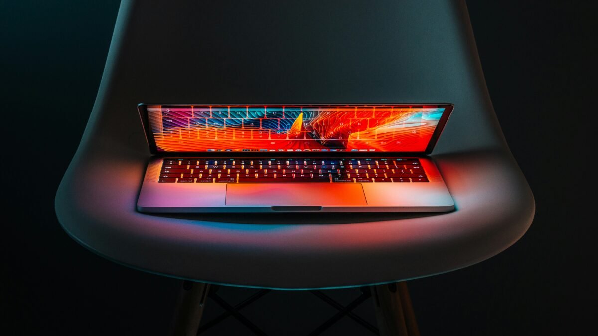 Laptop and code illustrating Mistral's new artificial intelligence model