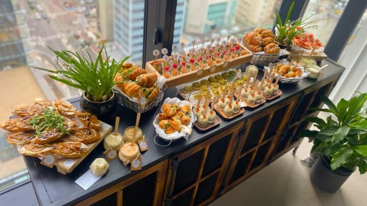 Corporate catering spread illustrating Uber's acquisition of ezCater